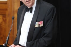 Rick Bayley introducing guest speaker, RADM Raydon Gates, AO